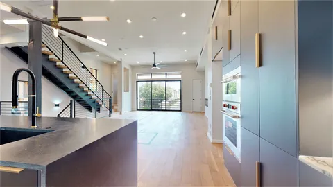 a view of entryway with wooden floor