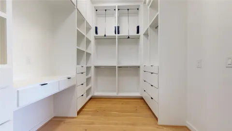 a bathroom with a shower and a toilet