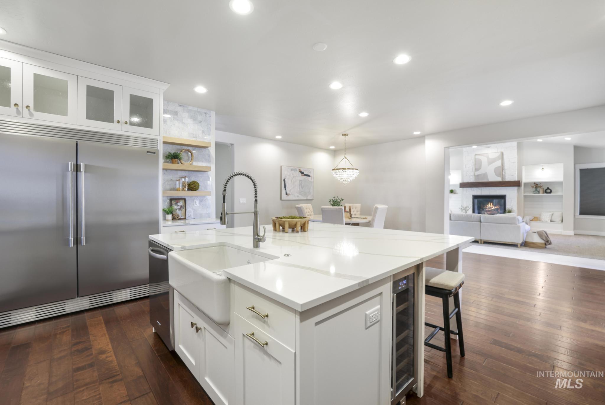3365 Willow Way Twin Falls, ID 83301 - Photo 13 of 50 Kitchen featuring white cabinets, built in shelves, a breakfast bar, and open shelves