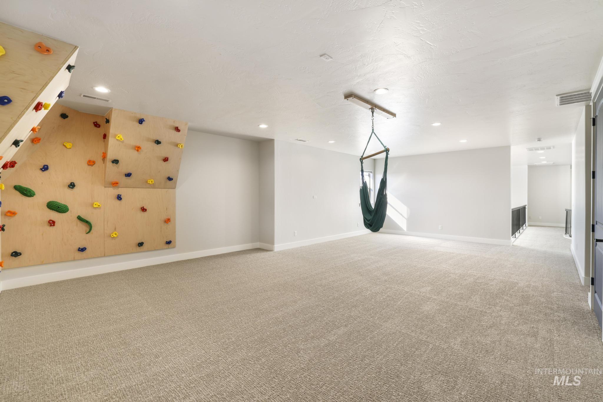 3365 Willow Way Twin Falls, ID 83301 - Photo 26 of 50 Empty room featuring light carpet and recessed lighting