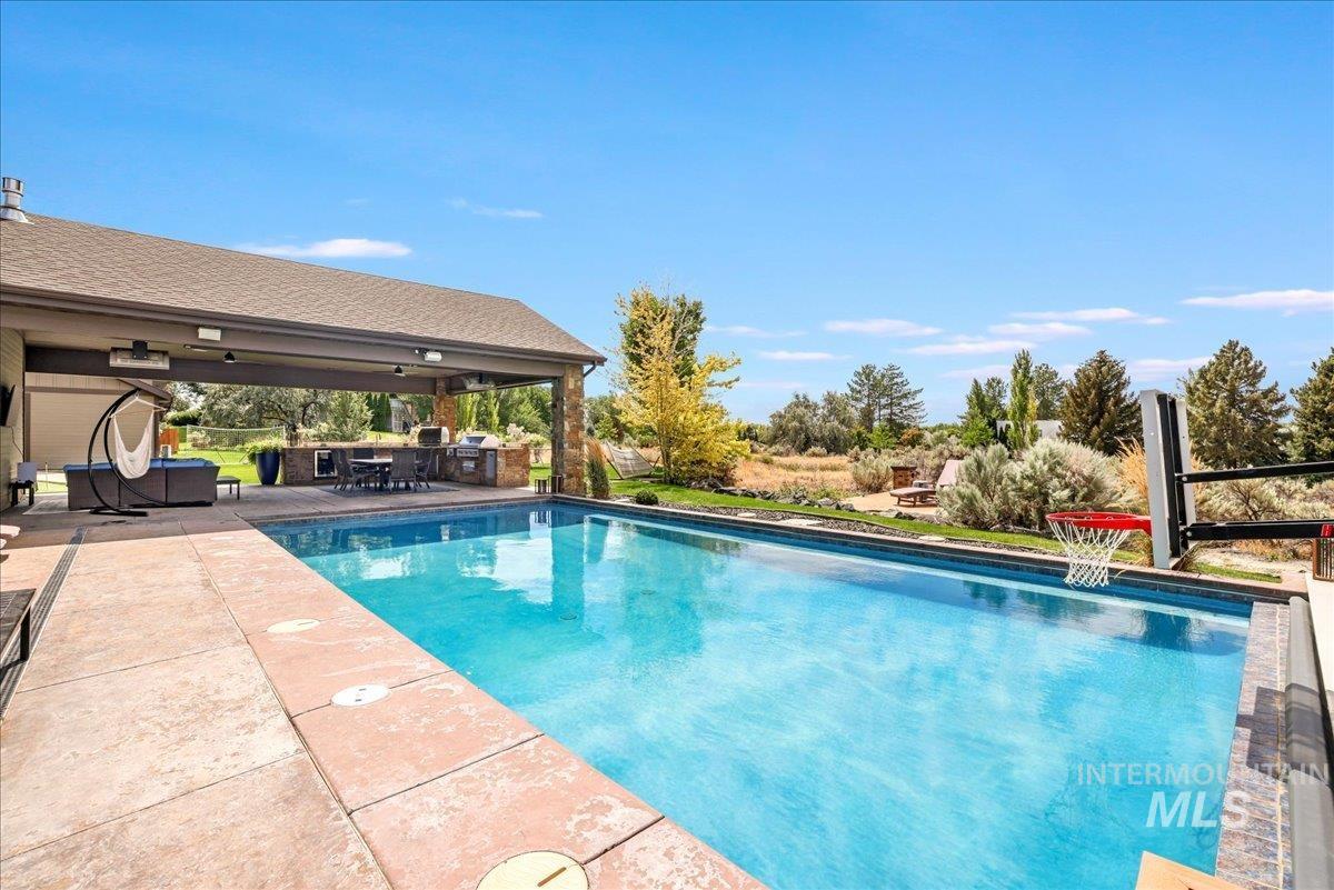 3365 Willow Way Twin Falls, ID 83301 - Photo 35 of 50 Swimming pool with a patio and area for grilling