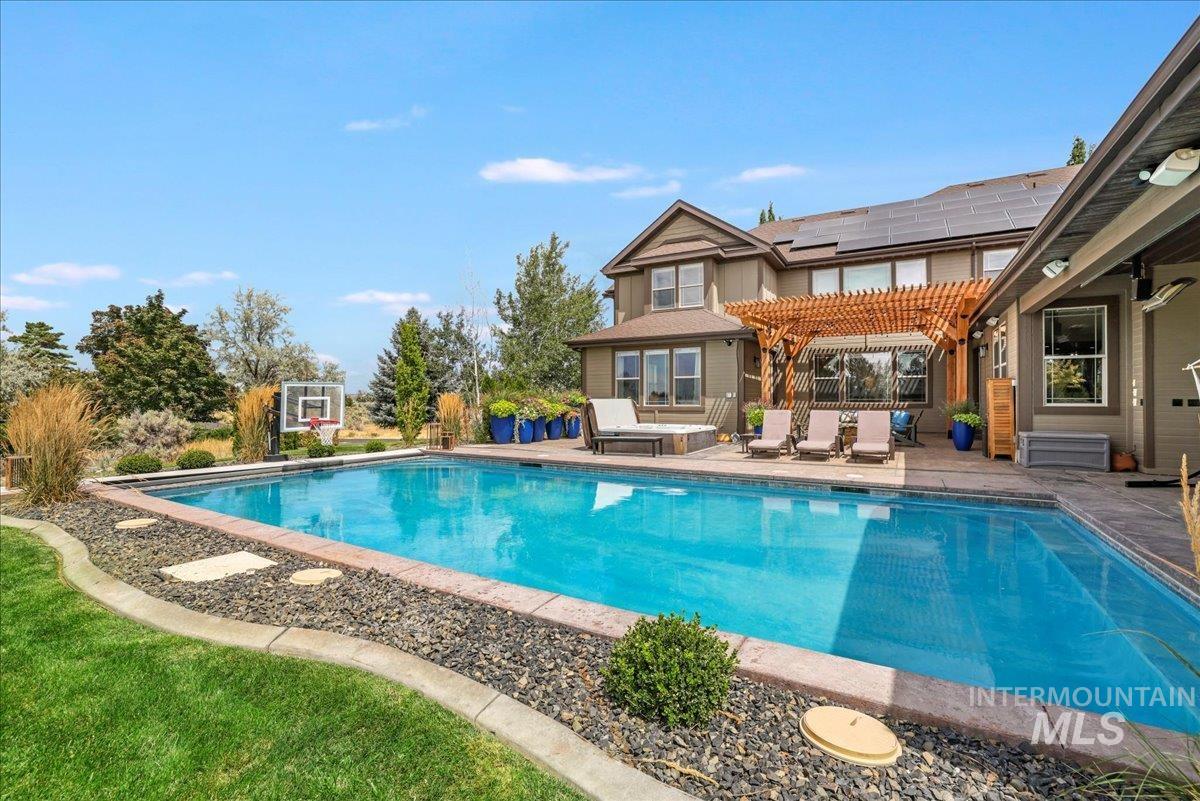 3365 Willow Way Twin Falls, ID 83301 - Photo 36 of 50 Swimming pool with a pergola and a patio