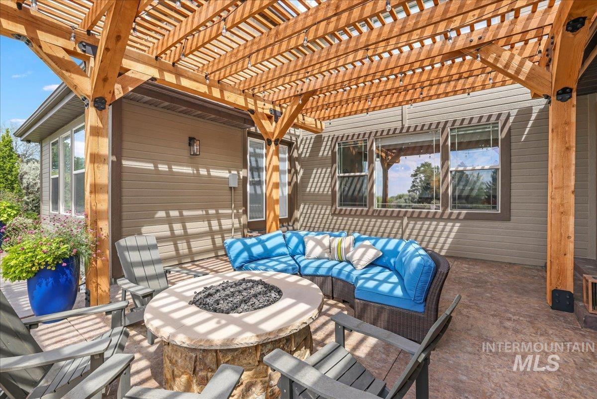 3365 Willow Way Twin Falls, ID 83301 - Photo 42 of 50 View of patio / terrace with a pergola and an outdoor living space with a fire pit