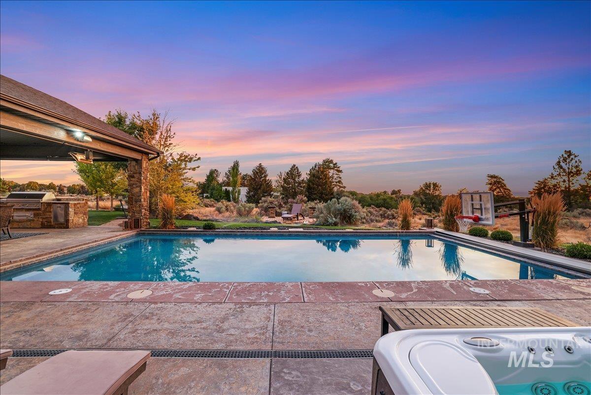 3365 Willow Way Twin Falls, ID 83301 - Photo 5 of 50 Outdoor pool featuring a patio area and exterior kitchen