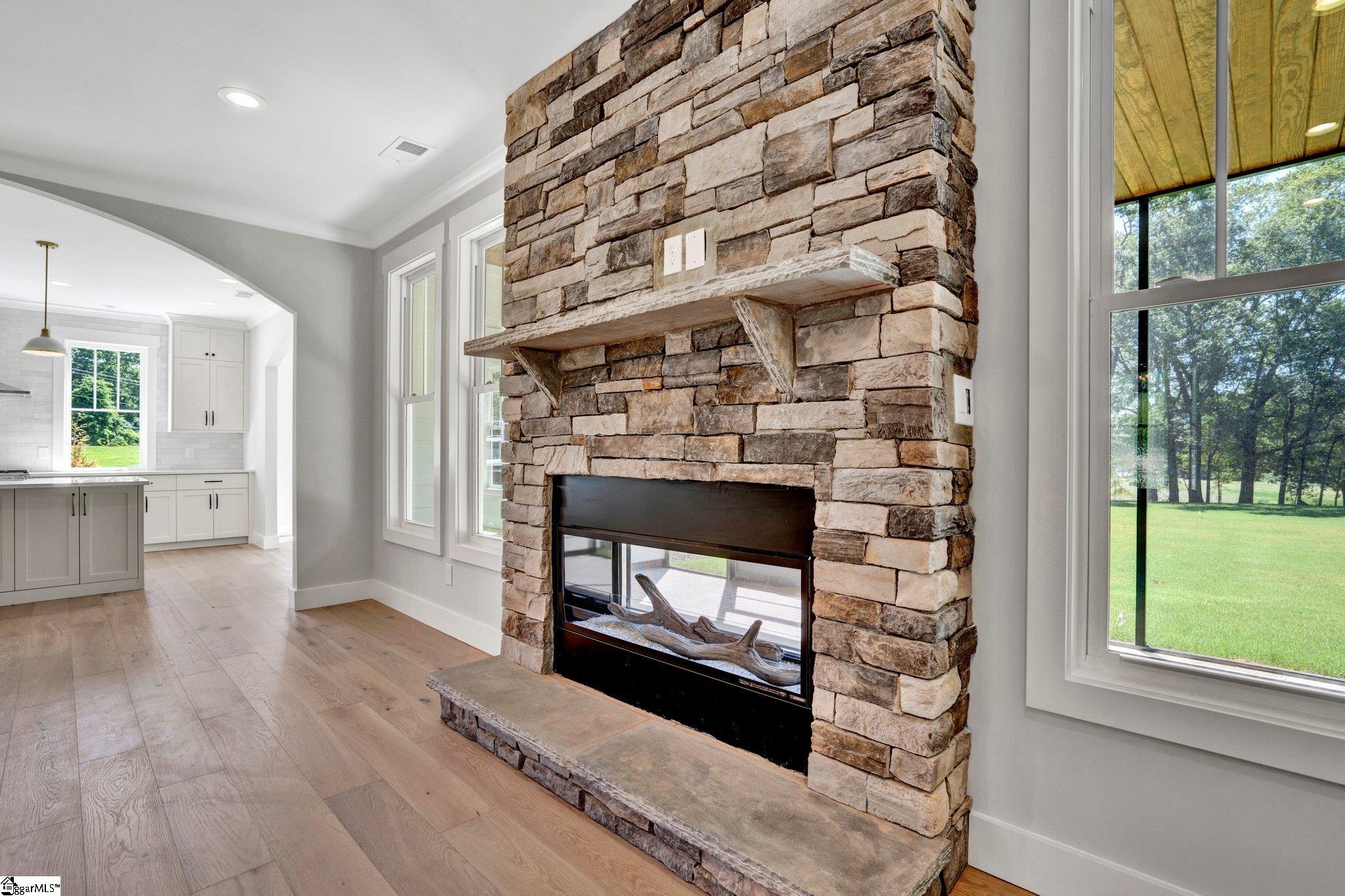 528 Log Shoals Road Greenville, SC 29607 - Photo 6 of 50 Color changing lights. Easy to use switch on the right side of the fireplace.