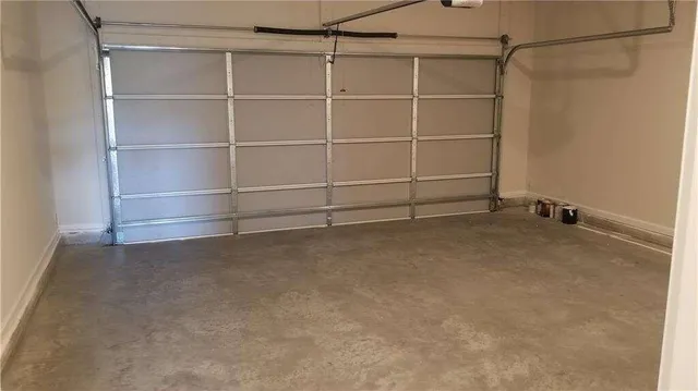 a view of an empty room with shelves