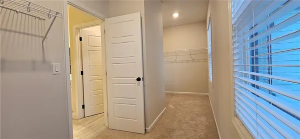 a bathroom with a shower and a sink