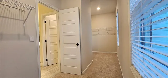 a bathroom with a shower and a sink