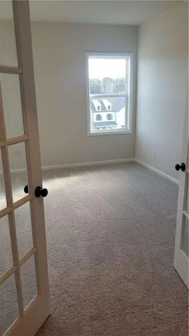 an empty room with windows