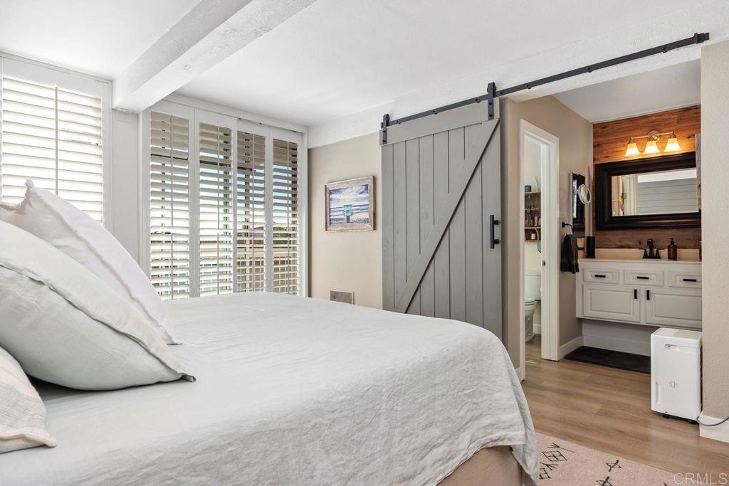 2327 Caringa Way, Unit 3 Carlsbad, CA 92009 - Photo 32 of 48 Primary Bedroom Suite