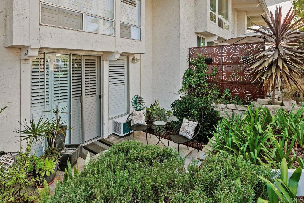 2327 Caringa Way, Unit 3 Carlsbad, CA 92009 - Photo 9 of 48 east facing patio off of bedroom 2