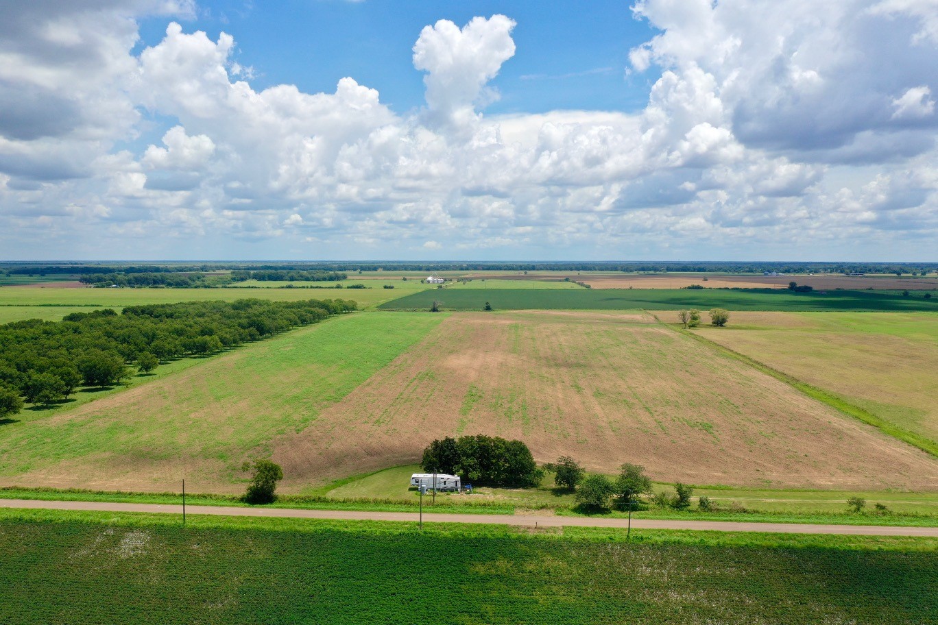 0 South County Road Eagle Lake, TX 77434 - Photo 3 of 26 a view of a golf course with a lake