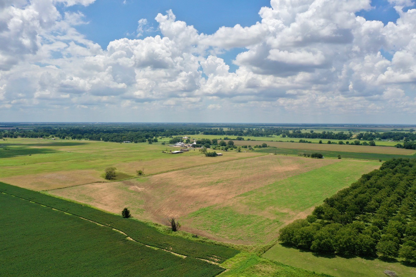 0 South County Road Eagle Lake, TX 77434 - Photo 6 of 26 a view of a lake with a big yard