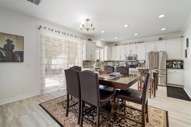 a view of a dining room with furniture