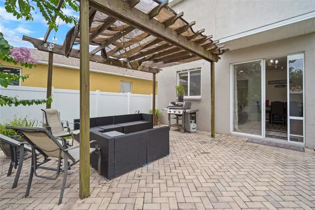 a view of a bedroom with workspace and toys