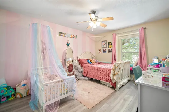 a bed room with furniture and a couch