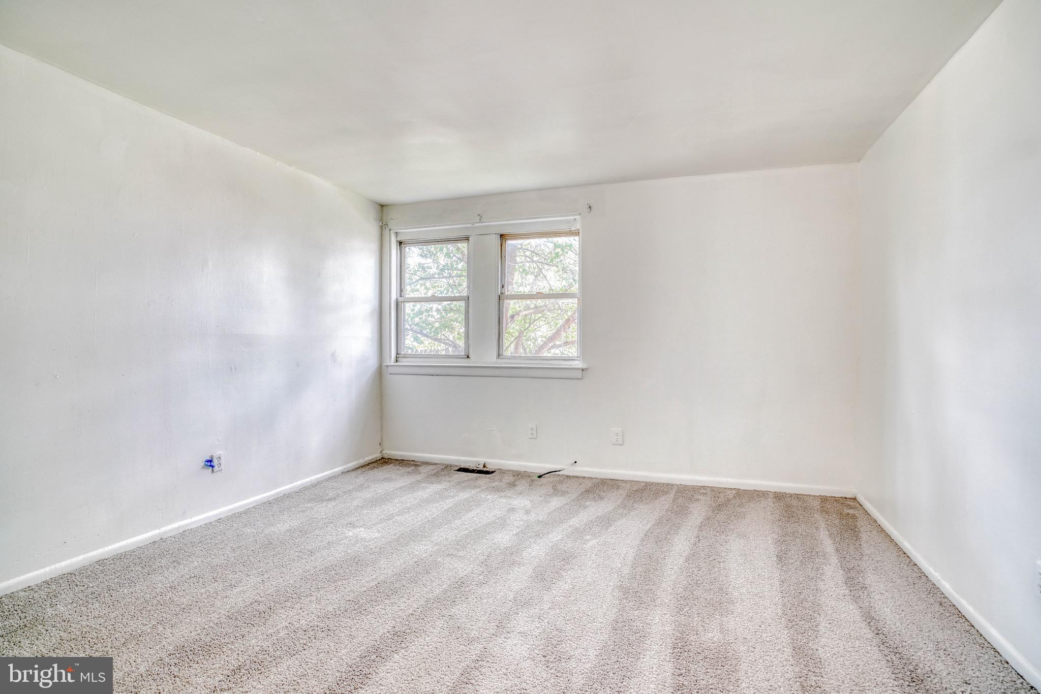 10203 East Keswick Road, Unit 1 Philadelphia, PA 19114 - Photo 18 of 23 an empty room with windows