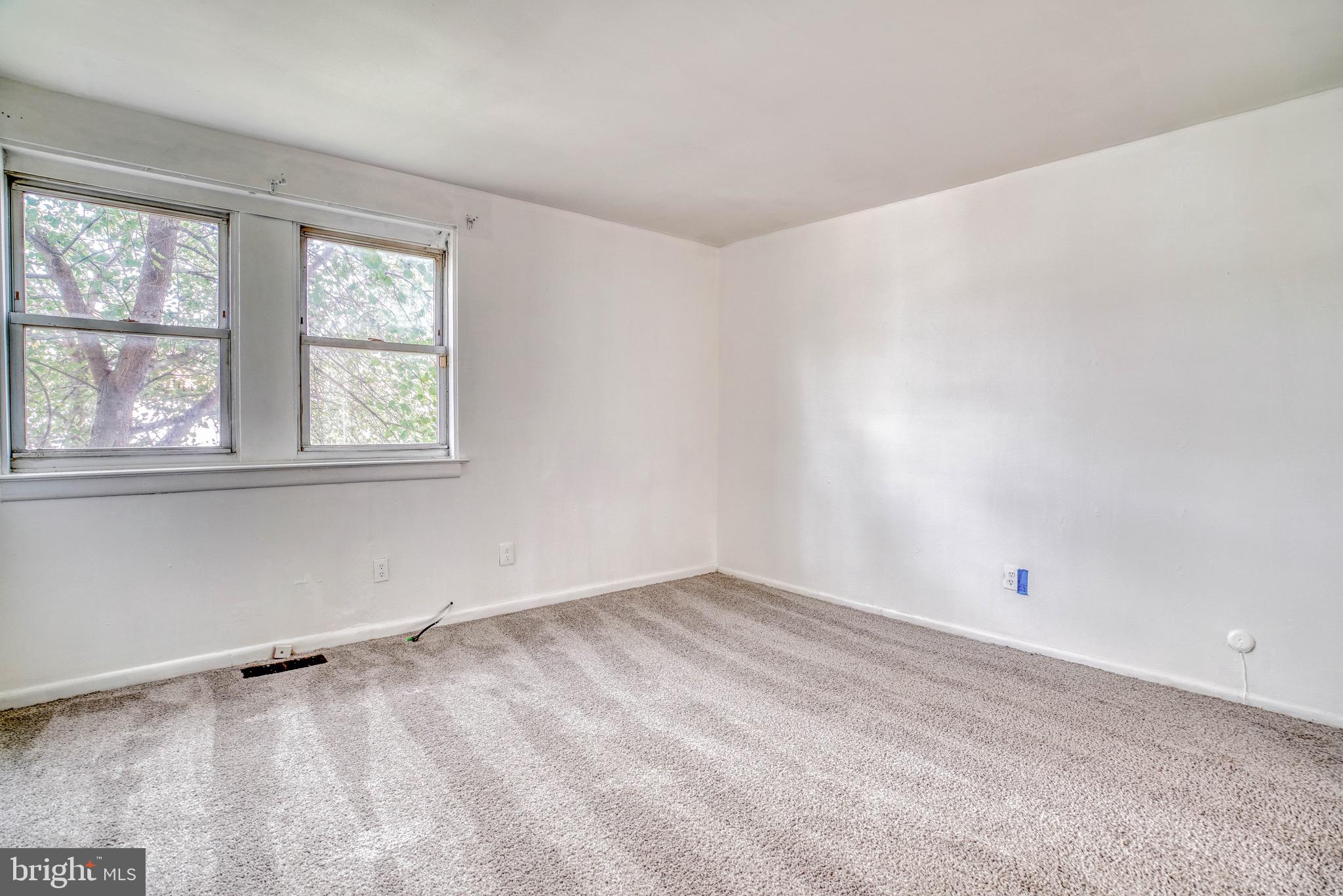 10203 East Keswick Road, Unit 1 Philadelphia, PA 19114 - Photo 19 of 23 an empty room with a window