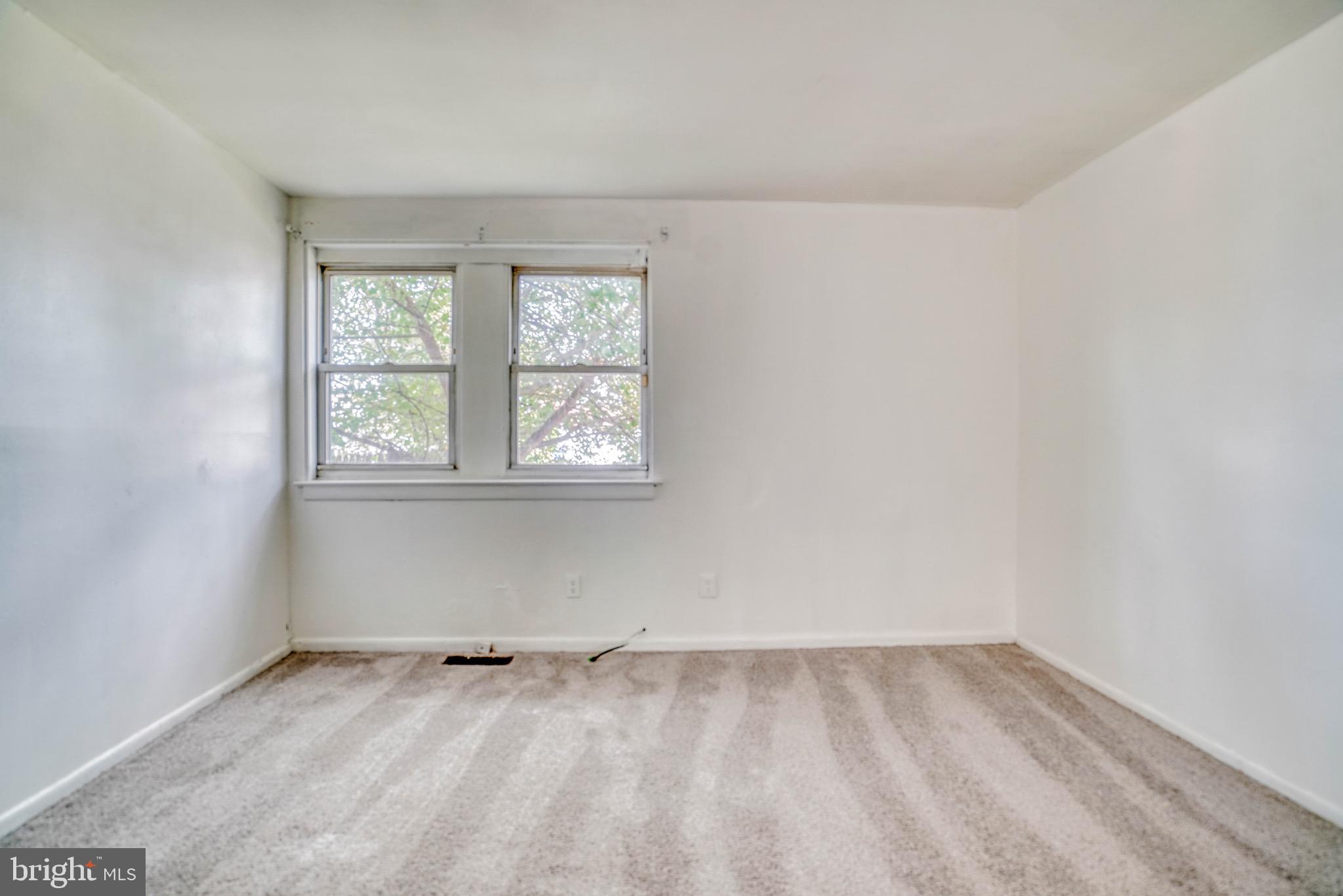 10203 East Keswick Road, Unit 1 Philadelphia, PA 19114 - Photo 20 of 23 an empty room with a window