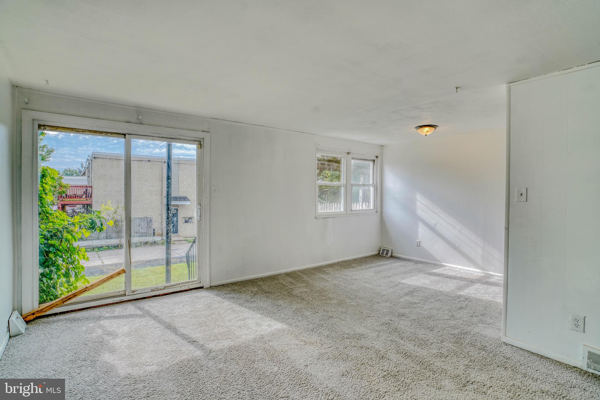 10203 East Keswick Road, Unit 1 Philadelphia, PA 19114 - Photo 2 of 23 an empty room with windows
