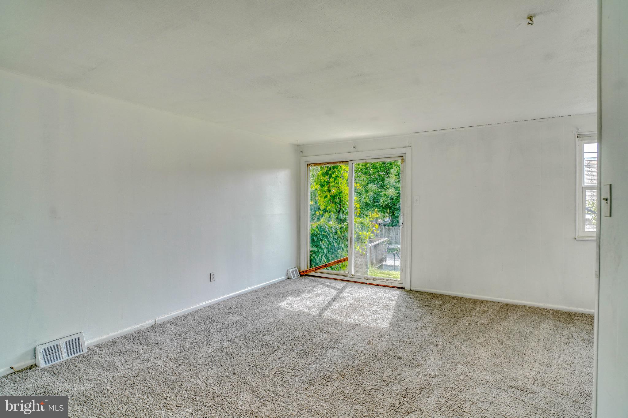10203 East Keswick Road, Unit 1 Philadelphia, PA 19114 - Photo 3 of 23 a view of an empty room with a window