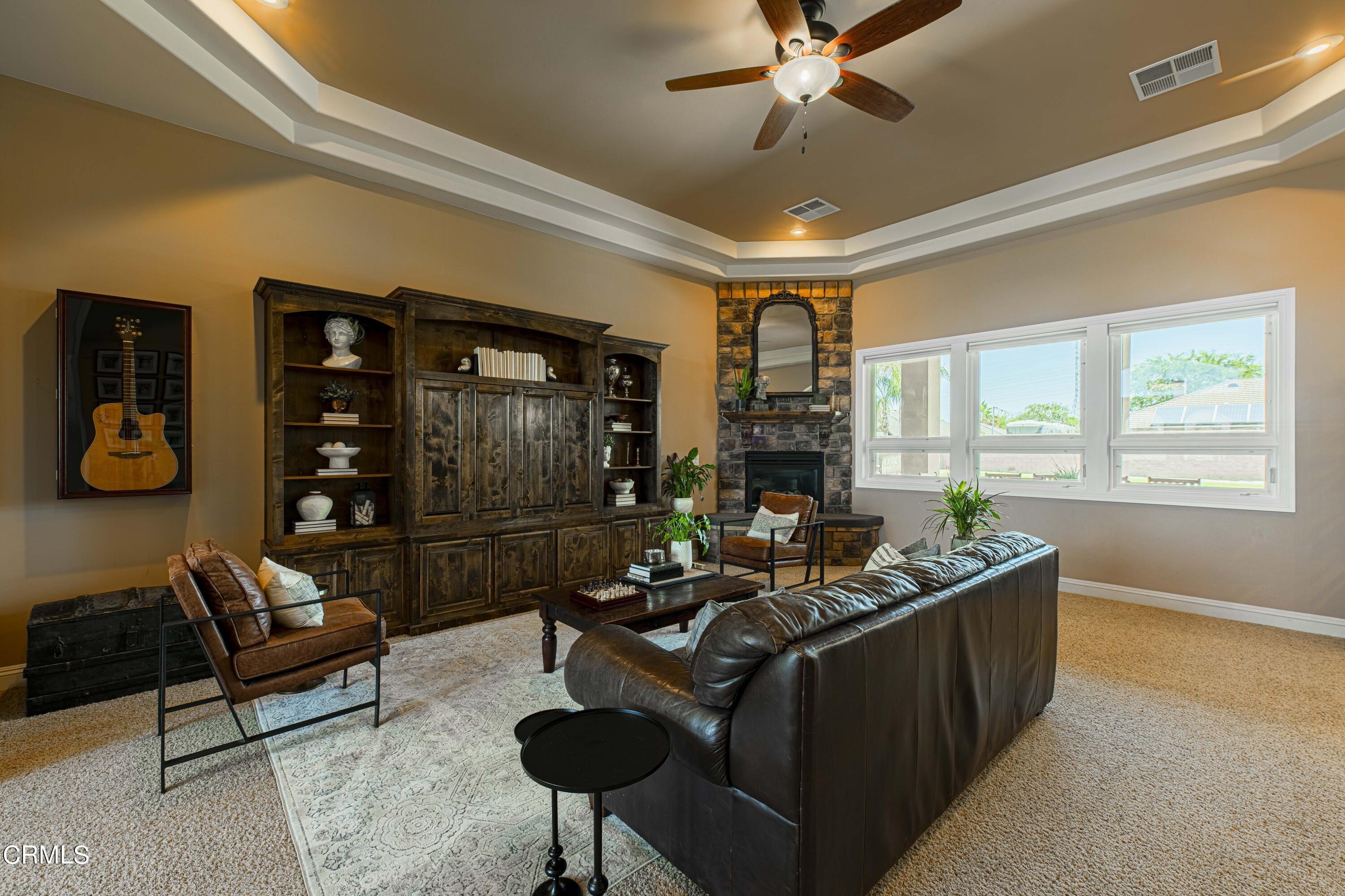 15023 Redwood Pass Drive Bakersfield, CA 93314 - Photo 11 of 67 a living room with furniture and a window
