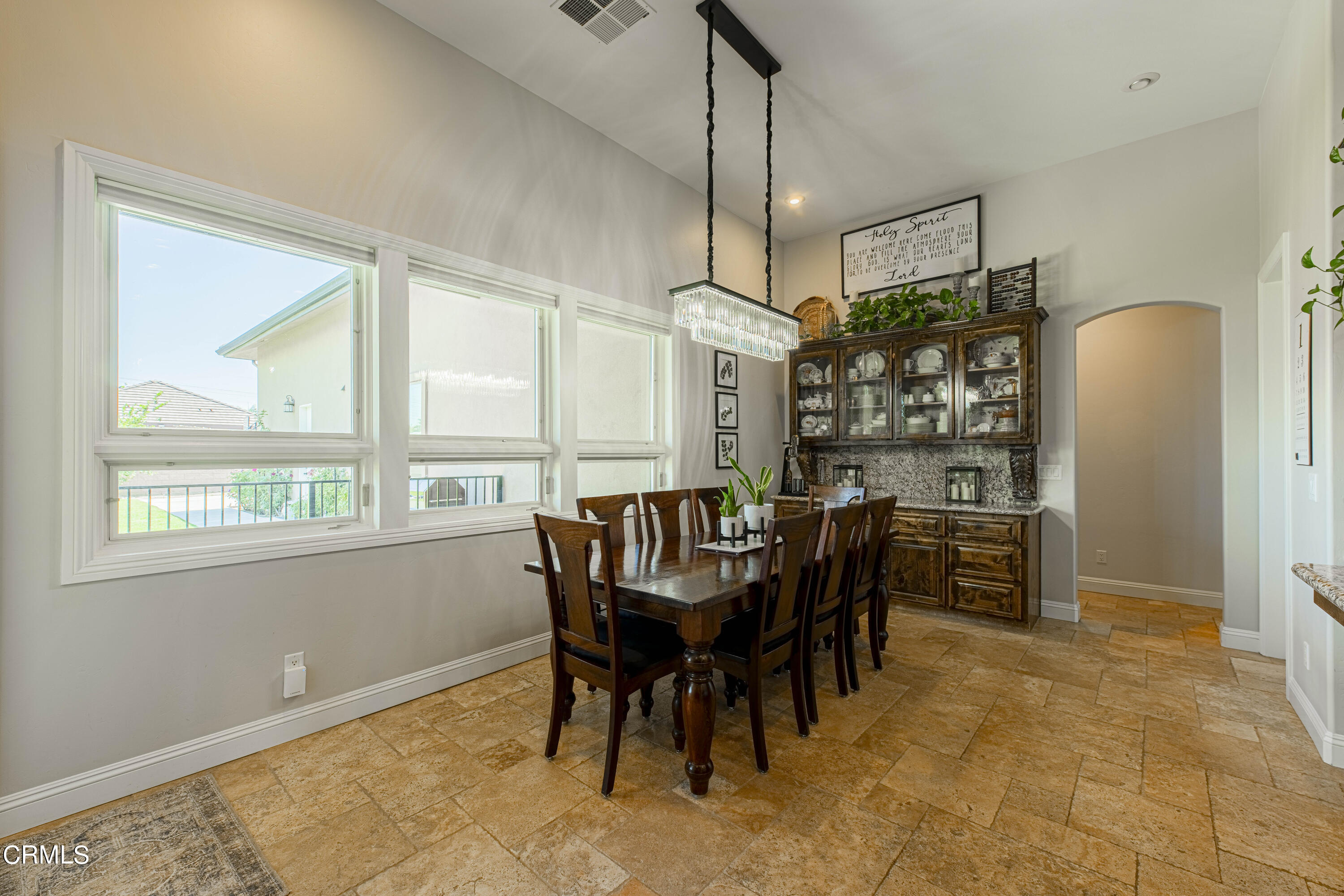15023 Redwood Pass Drive Bakersfield, CA 93314 - Photo 16 of 67 a view of a dining room with furniture window and outside view