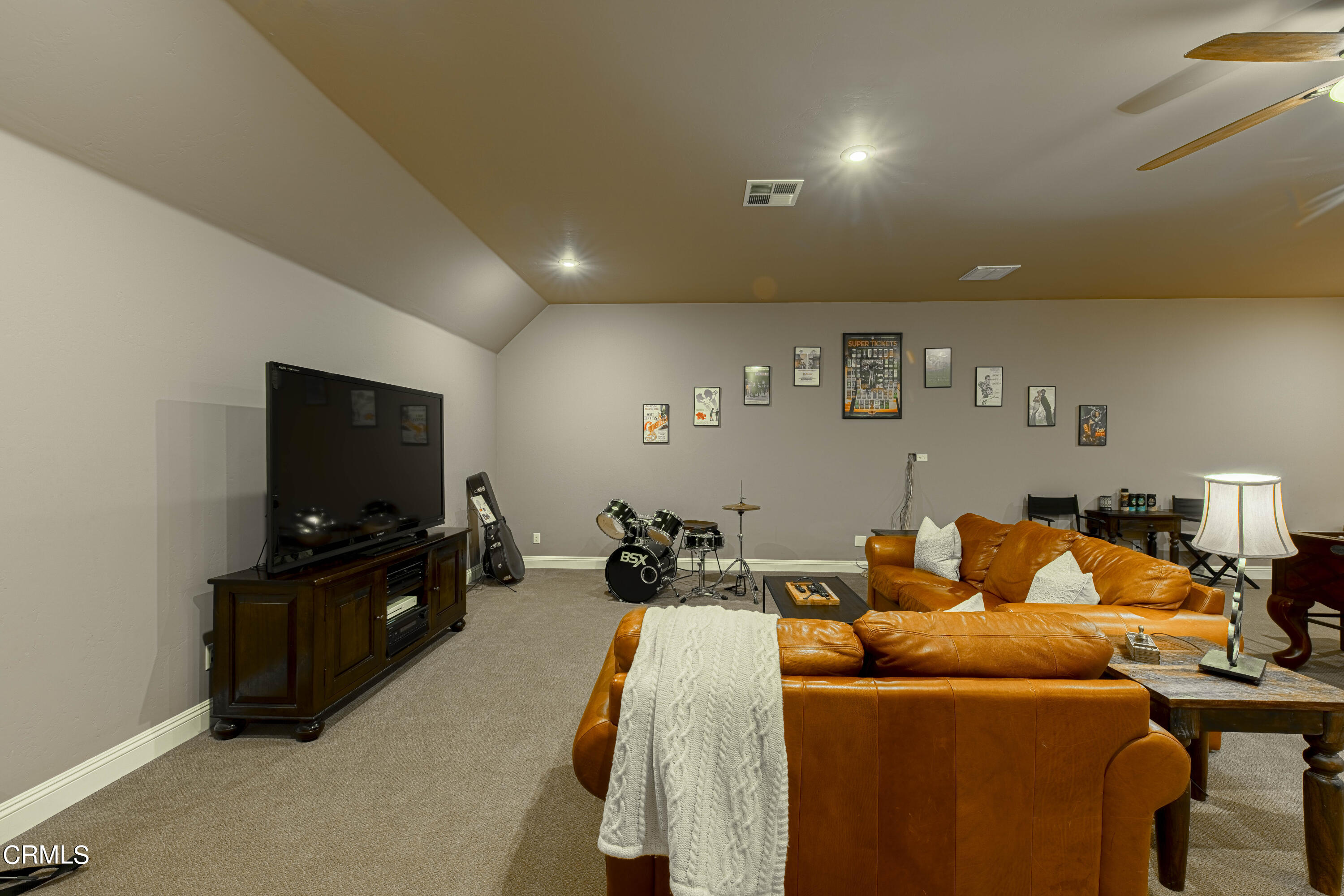 15023 Redwood Pass Drive Bakersfield, CA 93314 - Photo 49 of 67 a living room with furniture and a flat screen tv
