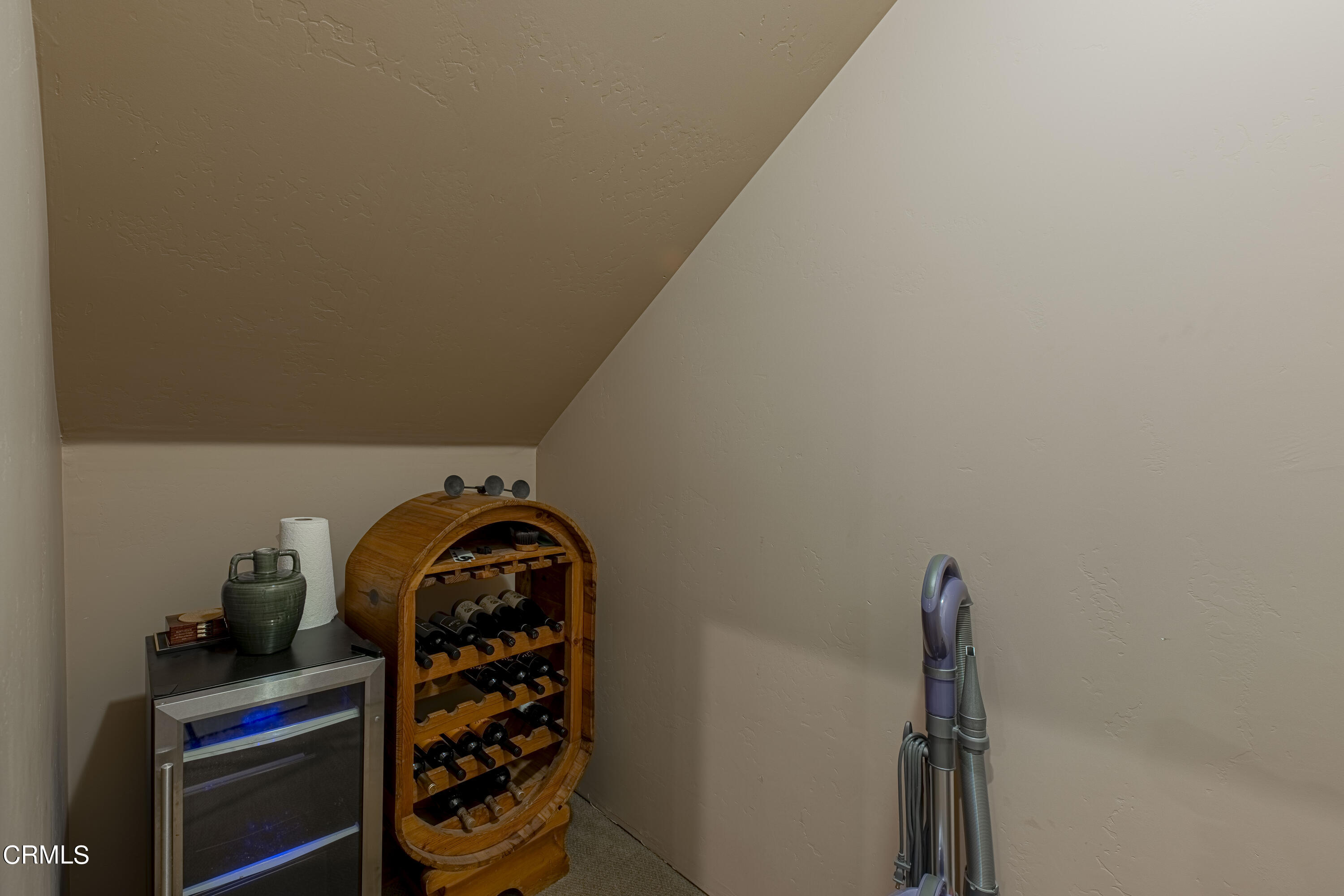 15023 Redwood Pass Drive Bakersfield, CA 93314 - Photo 55 of 67 a room with water heater and wooden cabinets