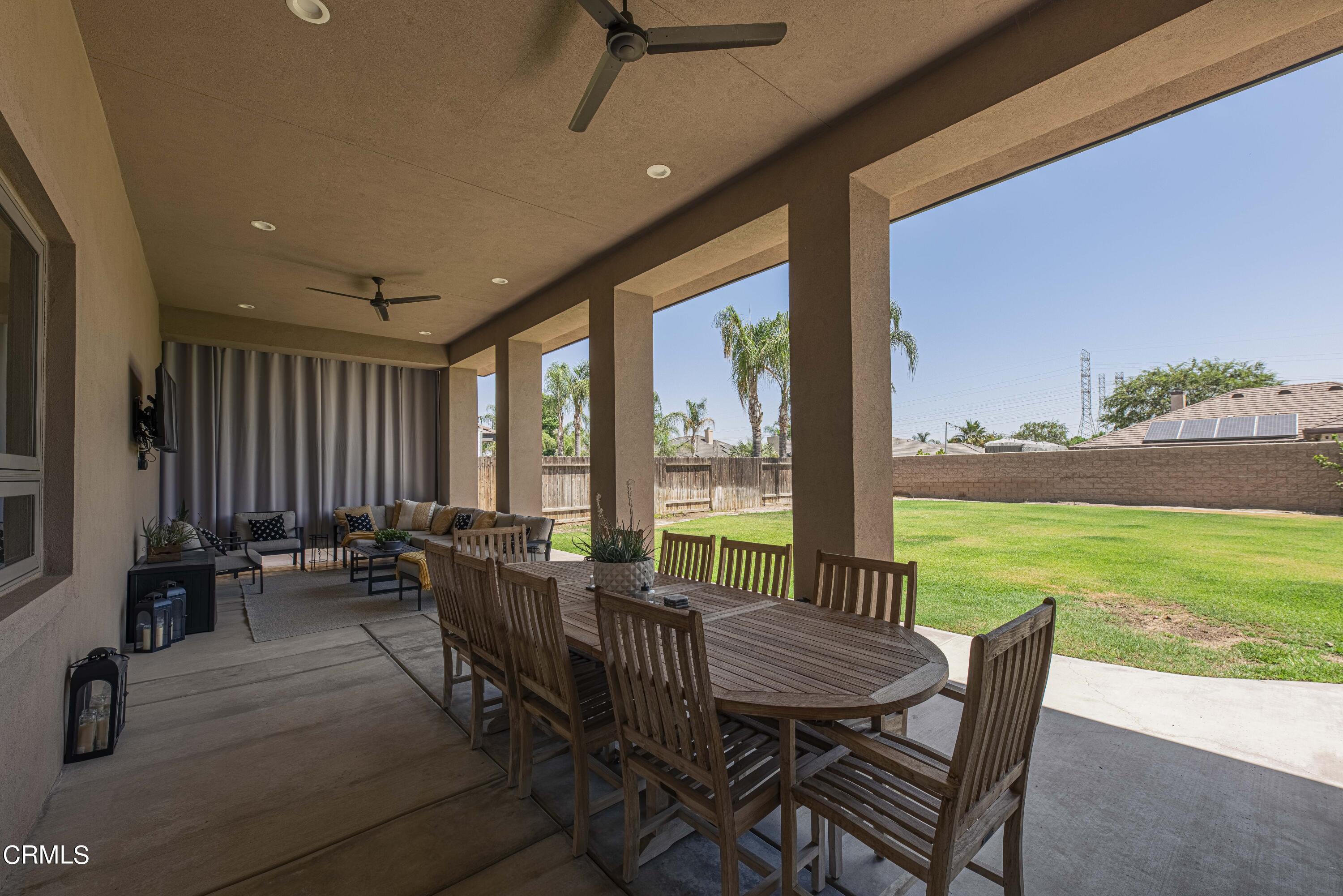 15023 Redwood Pass Drive Bakersfield, CA 93314 - Photo 57 of 67 a view of a dining room with furniture window and outside view