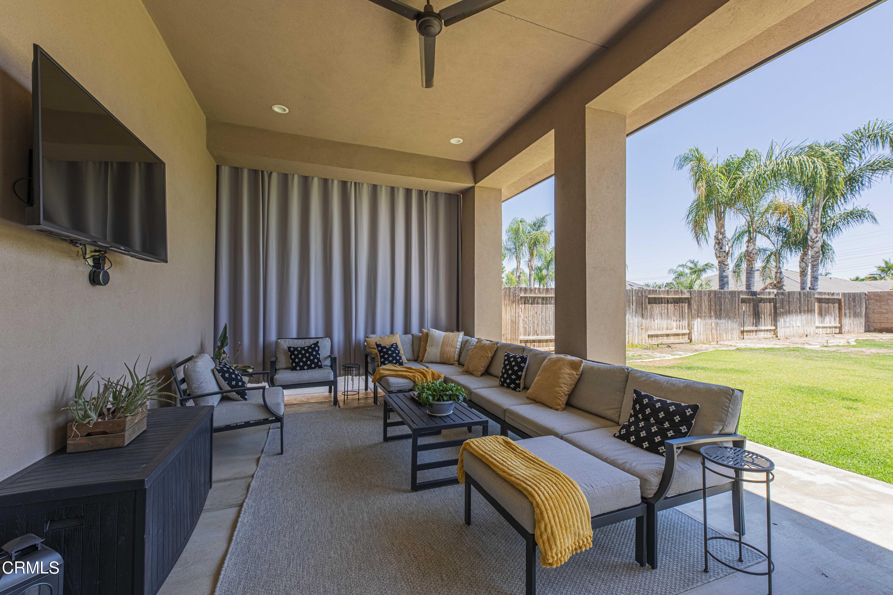 15023 Redwood Pass Drive Bakersfield, CA 93314 - Photo 58 of 67 a living room with furniture and a large window