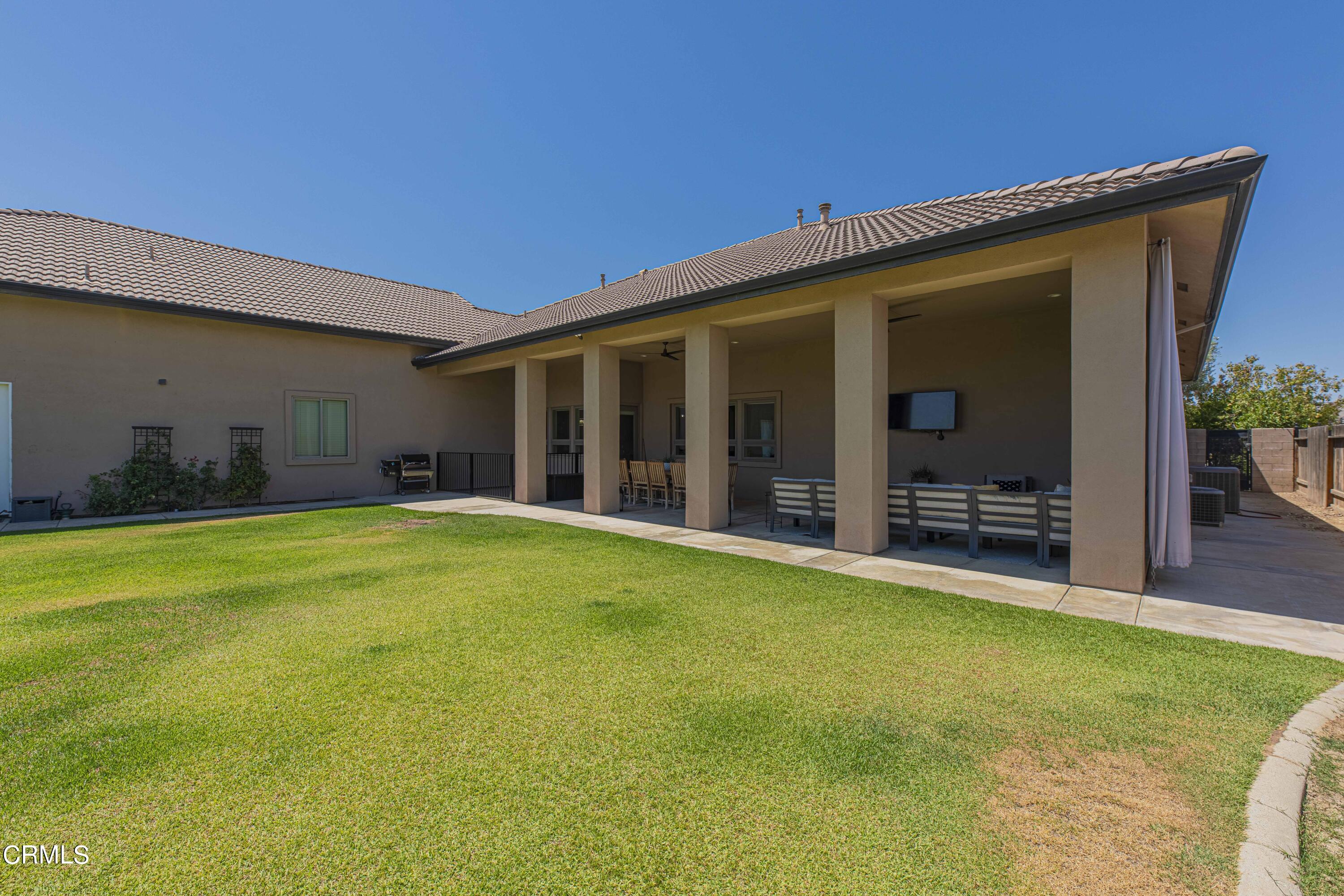 15023 Redwood Pass Drive Bakersfield, CA 93314 - Photo 61 of 67 a view of an house with backyard space and balcony
