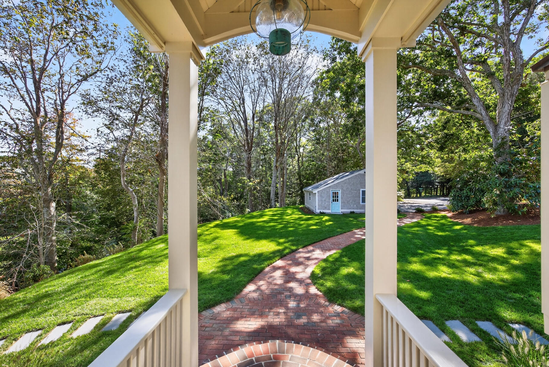 131 Timberlane Drive Mashpee, MA 02649 - Photo 53 of 57 a view of a yard with potted plants and large tree