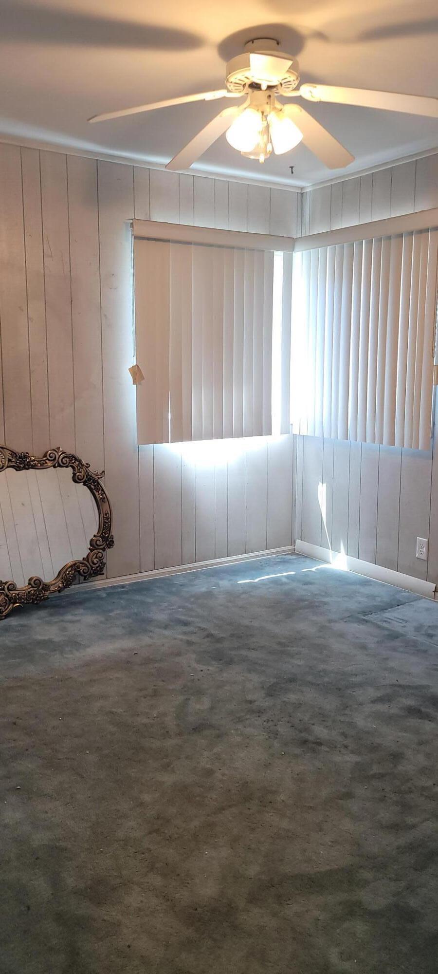 1103 West Bennett Street Compton, CA 90220 - Photo 12 of 20 a room with a bed and a window