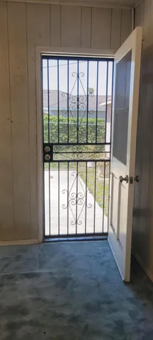 a bathroom with a sink toilet and window