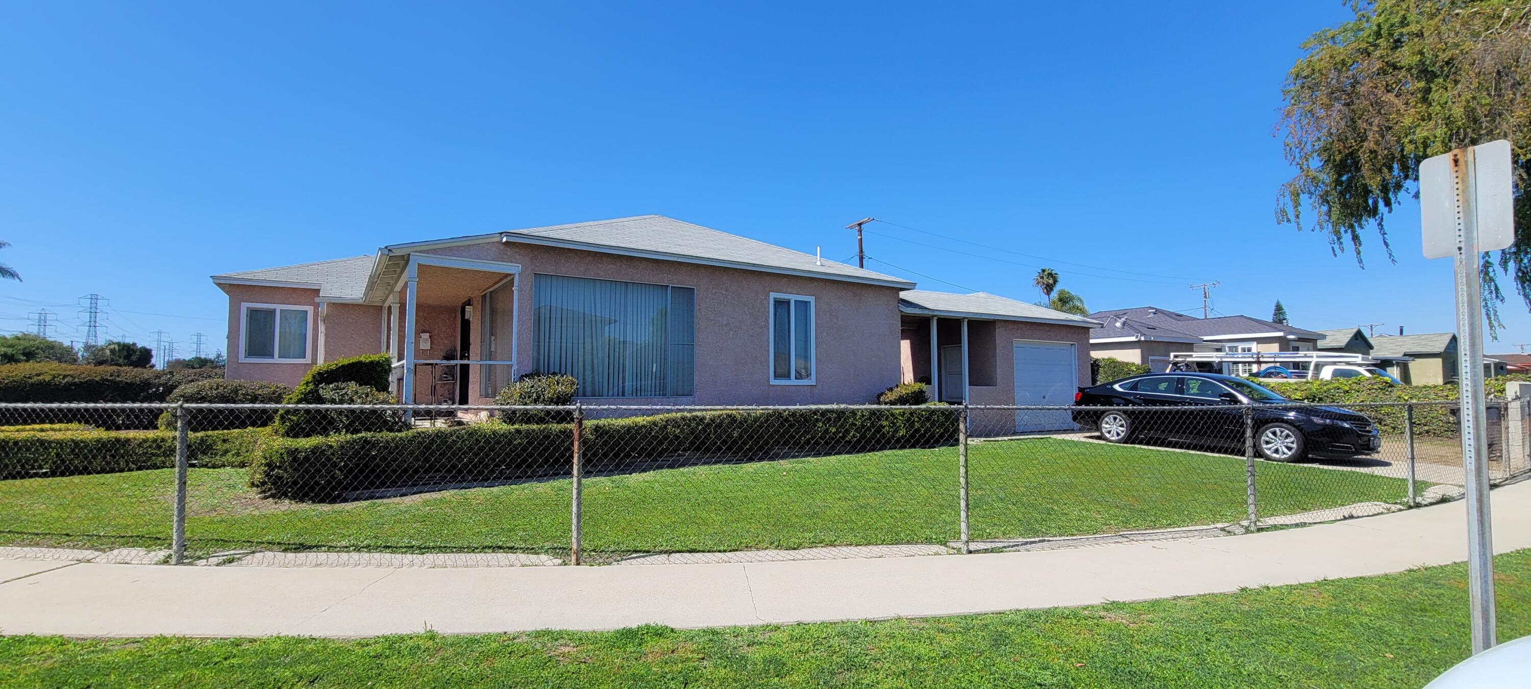 1103 West Bennett Street Compton, CA 90220 - Photo 3 of 20 a house view with a outdoor space