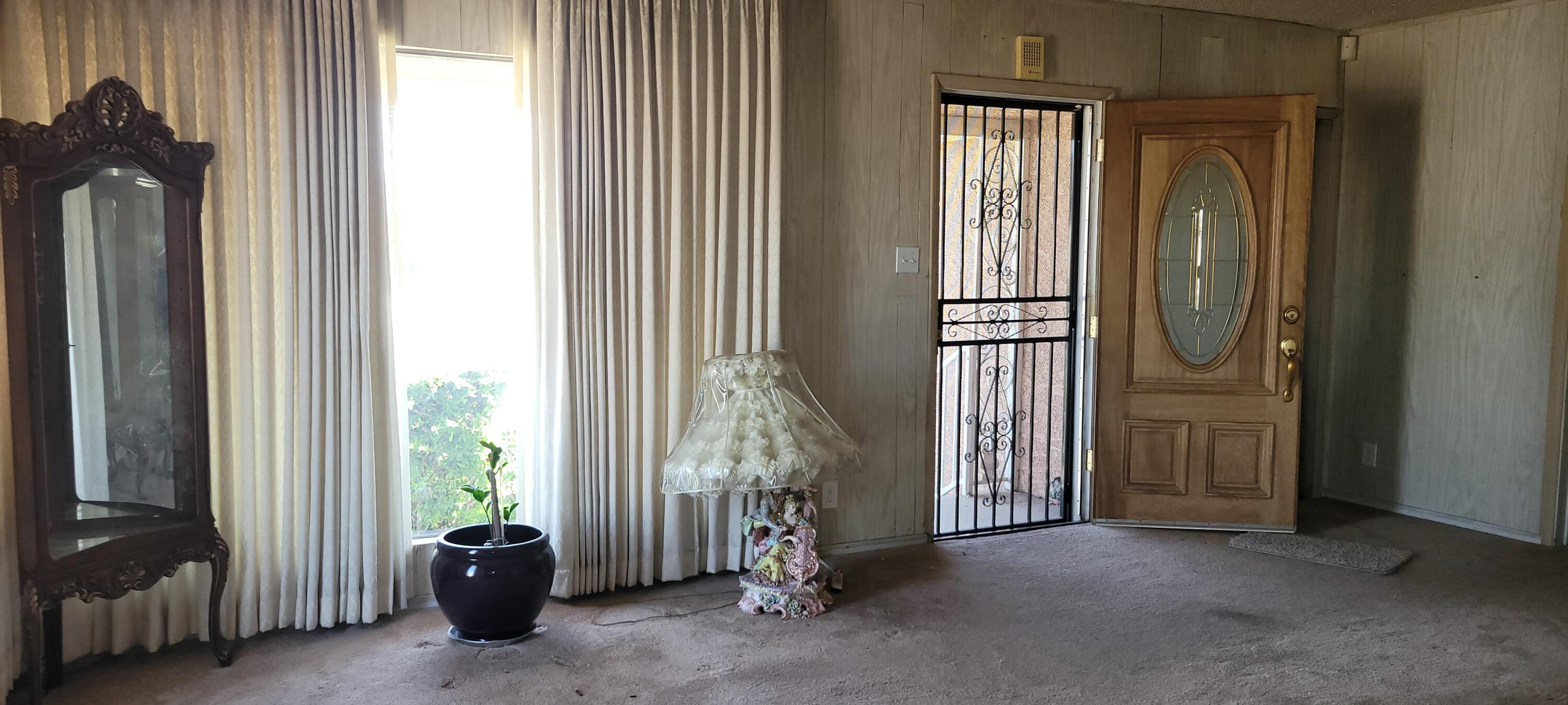 1103 West Bennett Street Compton, CA 90220 - Photo 6 of 20 a view of livingroom with furniture and windows