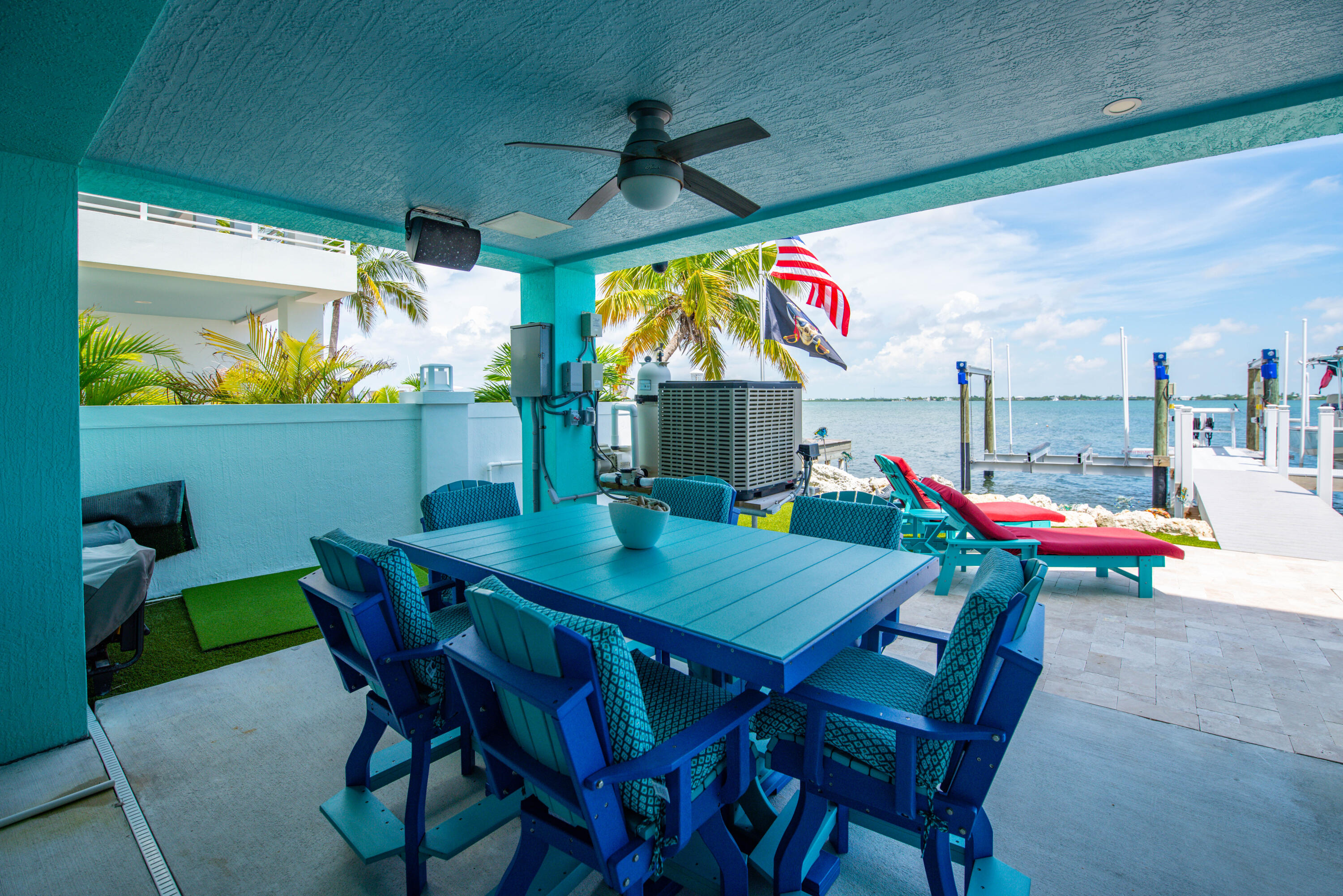 747 La Fitte Road Summerland Key, FL 33042 - Photo 45 of 103 a view of an outdoor dining space with furniture