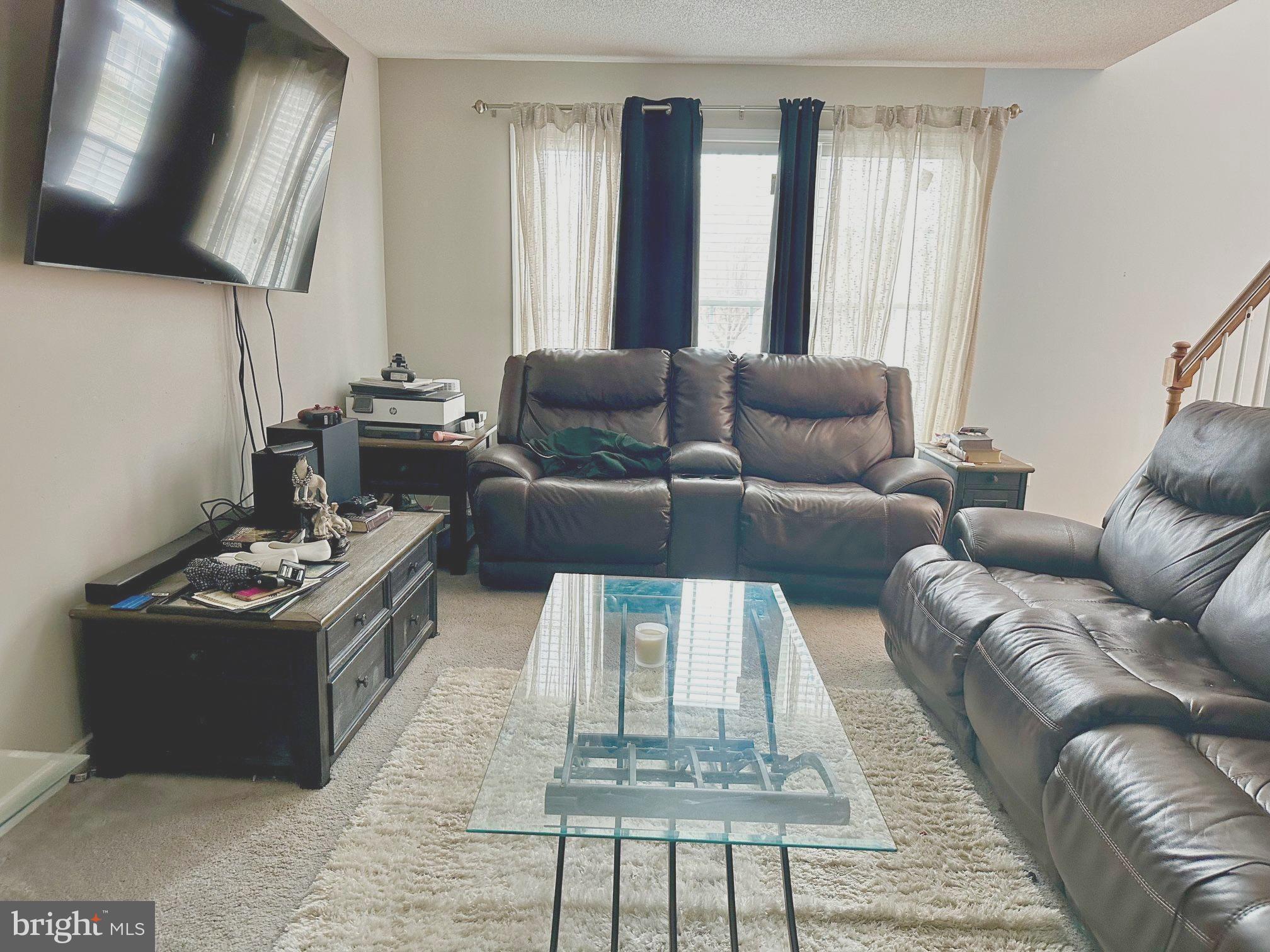 4343 Stately Oak Road North Chesterfield, VA 23234 - Photo 5 of 17 a living room with furniture and a fireplace