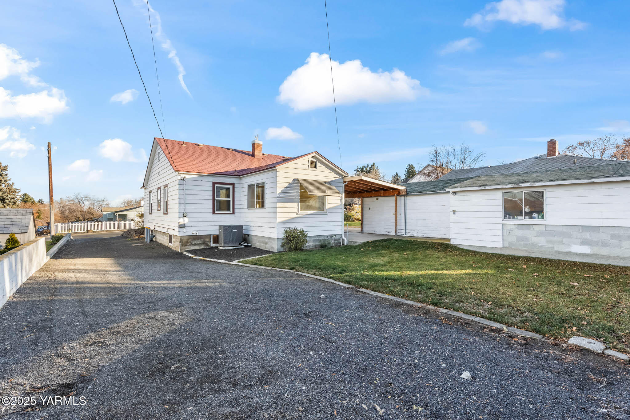304 North 35th Avenue Yakima, WA 98902 - Photo 15 of 31 a view of a house with a yard