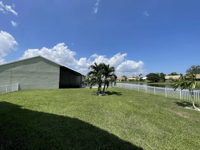 a view of a golf course with a lake