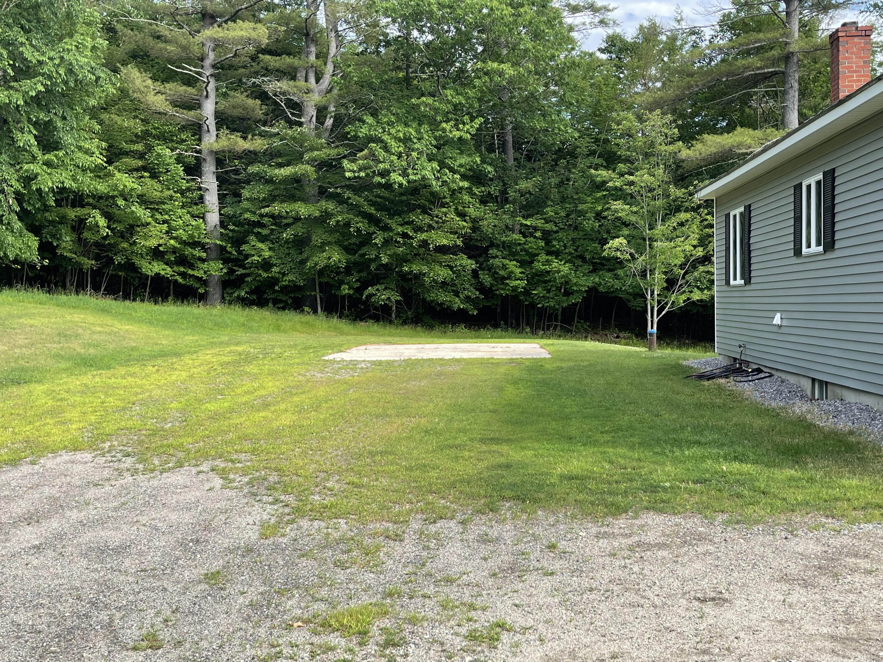 107 Hall Hill Road Dixfield, ME 04224 - Photo 2 of 23 107 Hall Hill cement pad for garage