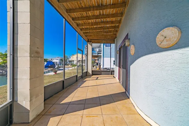 an aerial view of a house with outdoor space