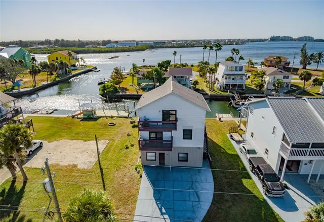 a terrace with outdoor seating and city view