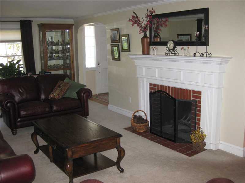 84 Old Great Road North Smithfield, RI 02896 - Photo 4 of 15 Living Room. Front to back living room with brick fireplace