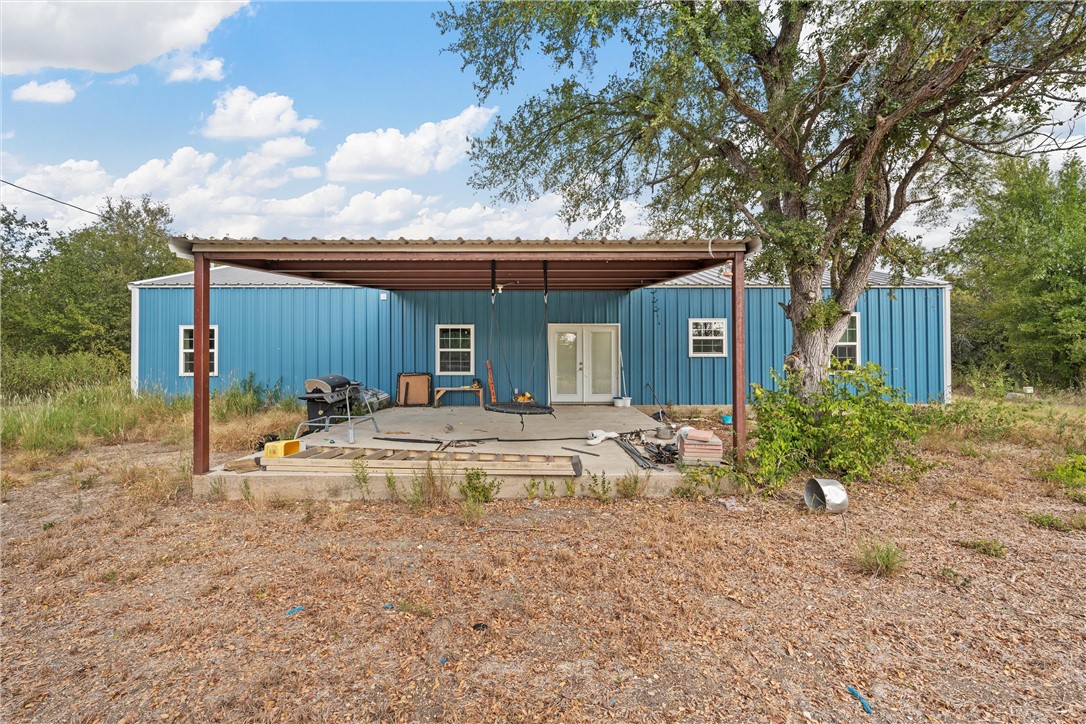 306 Randy Drive Woodway, TX 76712 - Photo 18 of 26 a view of a house with backyard and sitting area