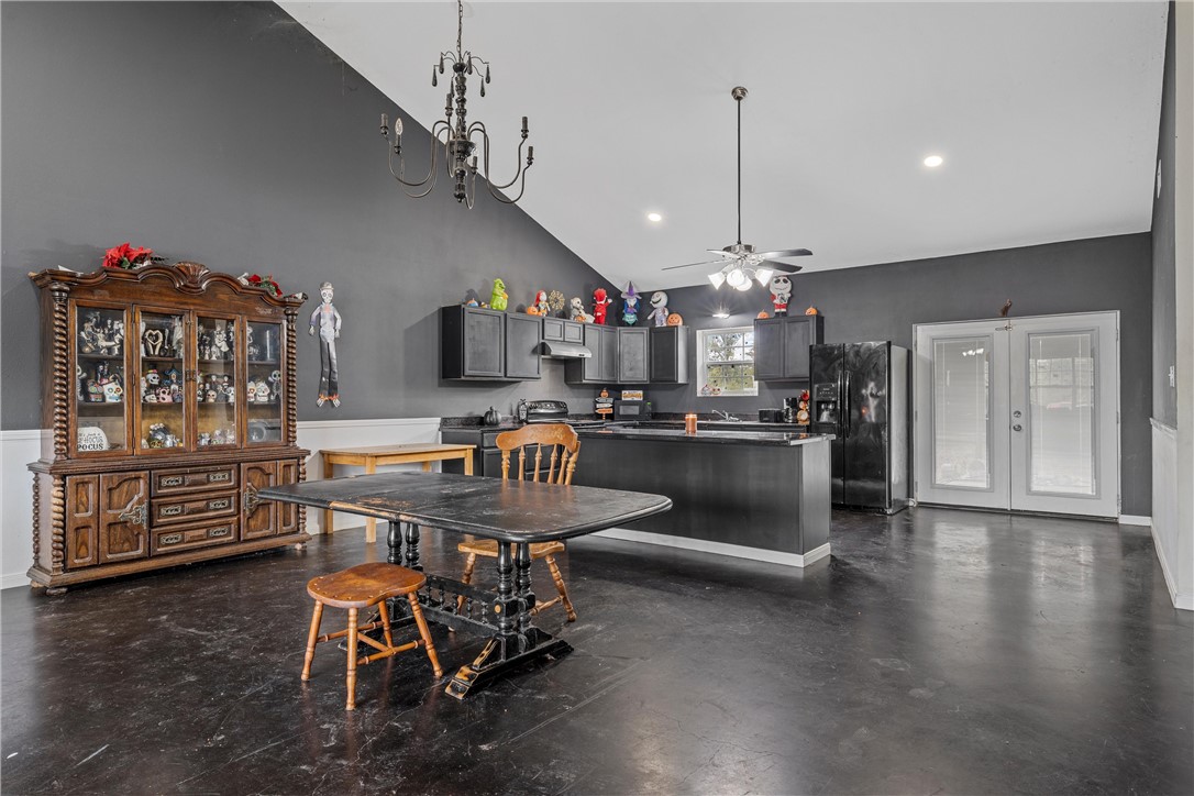 306 Randy Drive Woodway, TX 76712 - Photo 8 of 26 a kitchen and a refrigerator in a kitchen