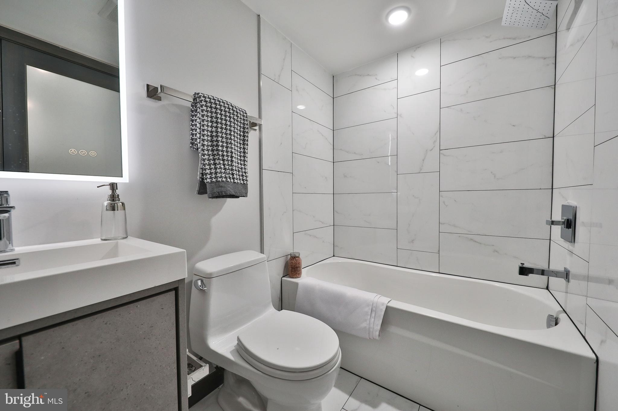 1024 Christian Street Philadelphia, PA 19147 - Photo 42 of 44 a bathroom with a sink toilet and shower