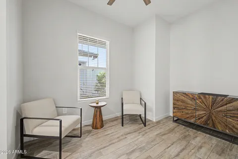 a living room with furniture and a window