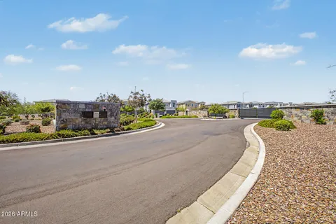 a view of a city street and a ocean view